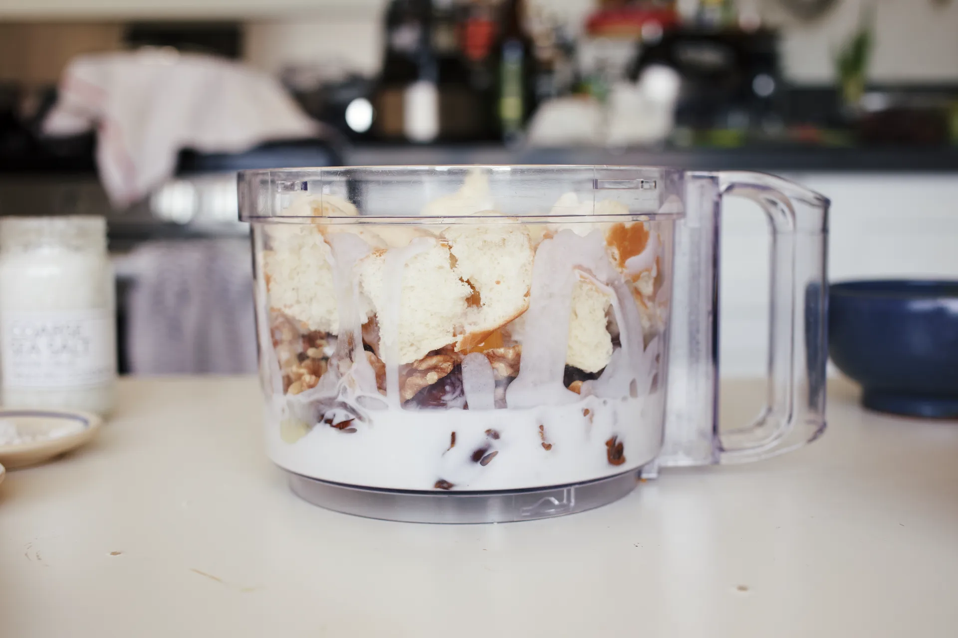 Food For the Gods Pan De Sal Bread Pudding ingredients in a food processor.