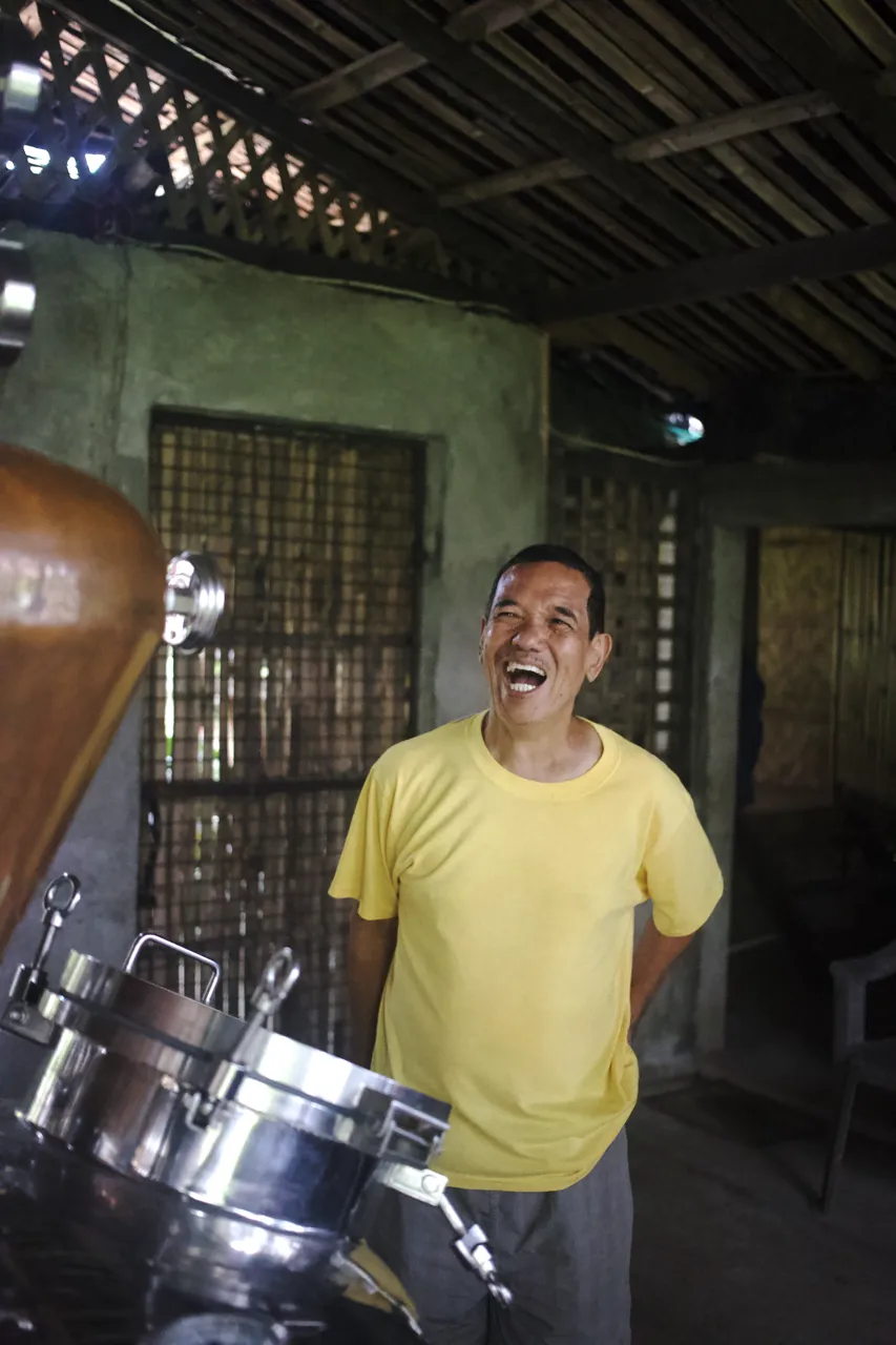 Victor Esmeris admiring his new still at the new distillery location